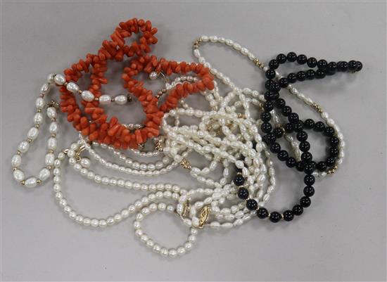 A coral necklace with 9ct gold clasp, three cultured pearl necklaces and bracelet and one black bead necklace,